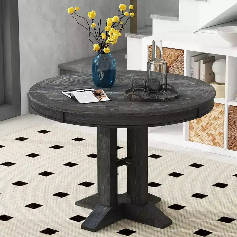 Tavolo da pranzo Whisen con base a piedistallo allungabile in legno stile rustico con prolunga da 35,5 cm