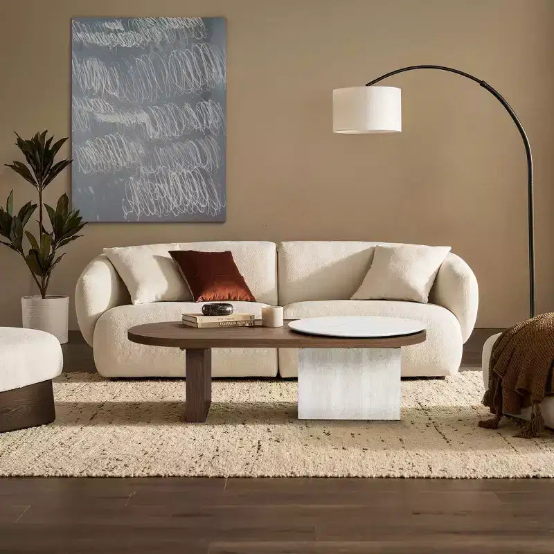 Tavolino da caffè ovale LuxenHome in MDF con effetto travertino e finitura noce, marrone