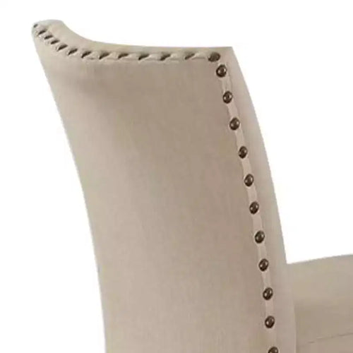 Set di 2 sgabelli Nolan da 63,5 cm per bancone e bar in lino beige/finitura rovere scuro anticato - Acme Furniture: Seduta imbottita, bordo con borchie, struttura in metallo