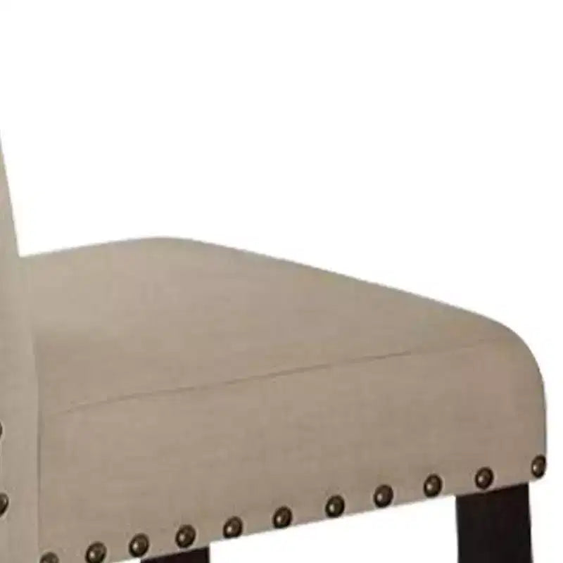 Set di 2 sgabelli Nolan da 63,5 cm per bancone e bar in lino beige/finitura rovere scuro anticato - Acme Furniture: Seduta imbottita, bordo con borchie, struttura in metallo