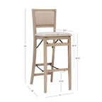 Sgabello pieghevole da bar Keira con schienale imbottito e seduta rivestita in legno massello lavato grigio - Linon