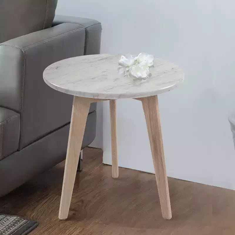 Il tavolino Bianco Collection Cherie 15 rotondo in marmo bianco di Carrara italiano