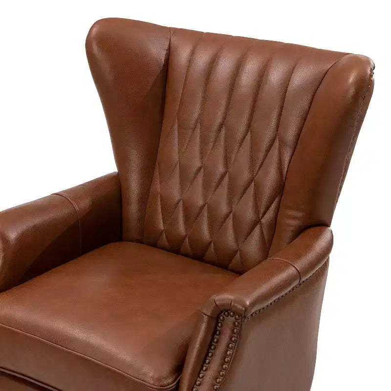 Poltrona Valerius in vera pelle con finiture borchiate e gambe in legno massello | HULALA HOME