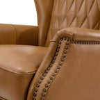 Poltrona Valerius in vera pelle con finiture borchiate e gambe in legno massello | HULALA HOME