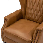 Poltrona Valerius in vera pelle con finiture borchiate e gambe in legno massello | HULALA HOME