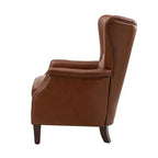 Poltrona Valerius in vera pelle con finiture borchiate e gambe in legno massello | HULALA HOME