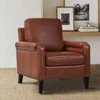Poltrona Hellmuth in vera pelle con cuscino rimovibile e borchie | HULALA HOME