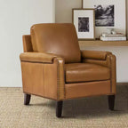 Poltrona Hellmuth in vera pelle con cuscino rimovibile e borchie | HULALA HOME