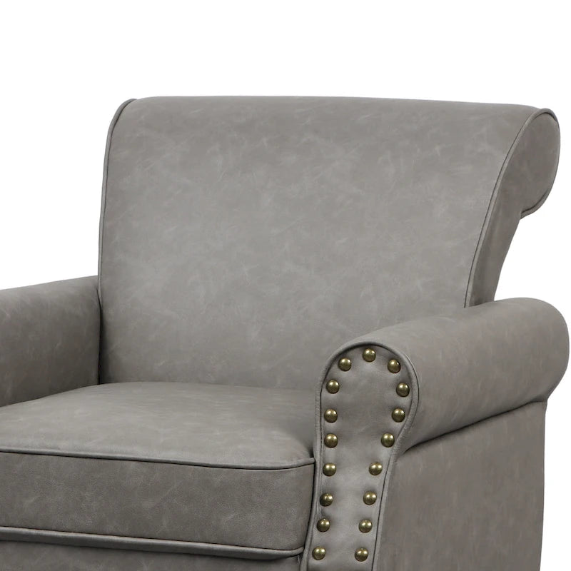 Poltroncina in PU con braccioli arrotolati e finiture borchiate