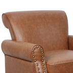 Poltroncina in PU con braccioli arrotolati e finiture borchiate