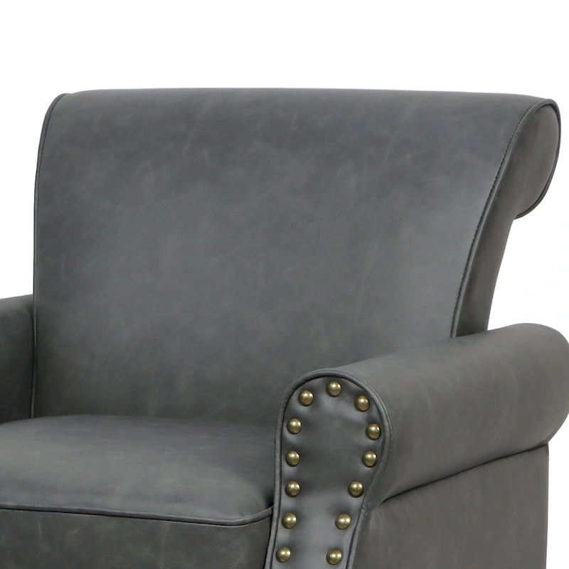 Poltroncina in PU con braccioli arrotolati e finiture borchiate